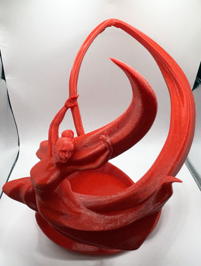 A Dancing Red Wine Holder