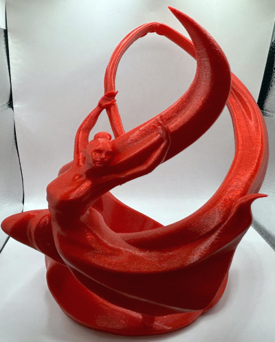 A Dancing Red Wine Holder