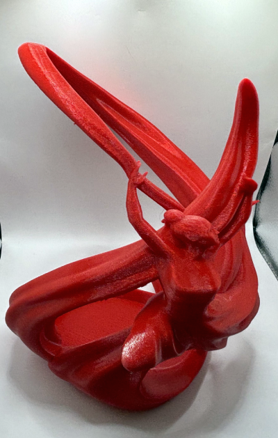 A Dancing Red Wine Holder