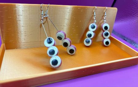 Chic Googly Eye Earrings that Glow in the Dark by DPS COOP - Fun Festival and Night Life Accessory